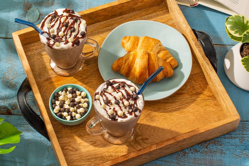 Milkshakes and croissant on a tray
