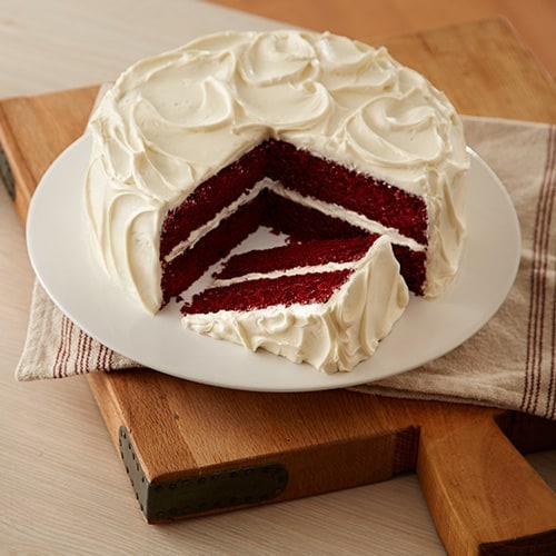 Cake with slice removed on a plate