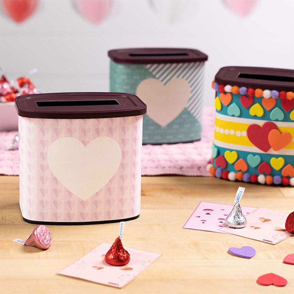 decorating valentines day exchange boxes and cards with candy