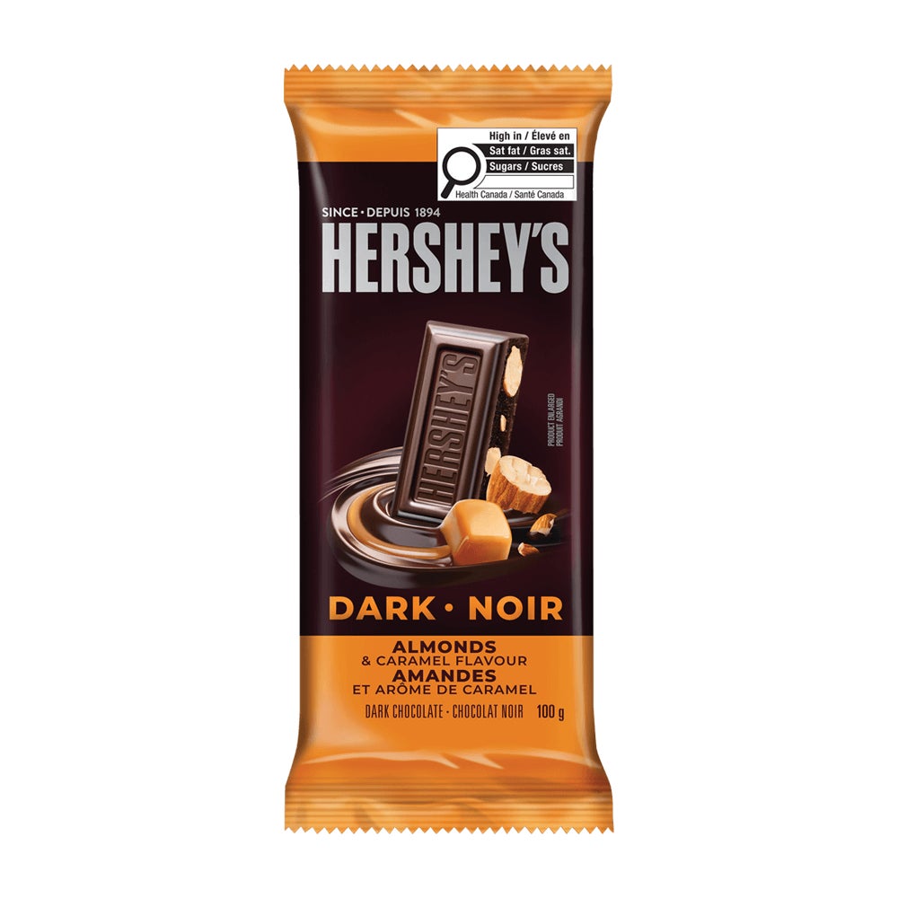 Barre HERSHEY’S NOIR Amandes et arôme de caramel, 100 g​​ - Devant de l’emballage